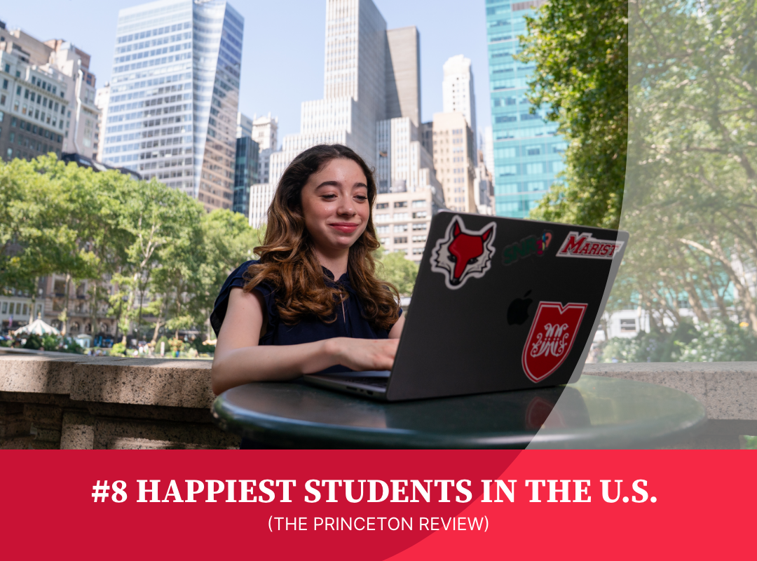 A student working on a laptop.