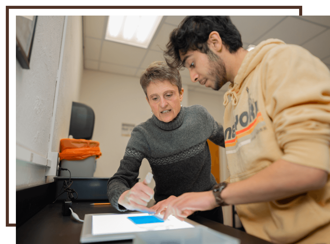 A professor working with a student